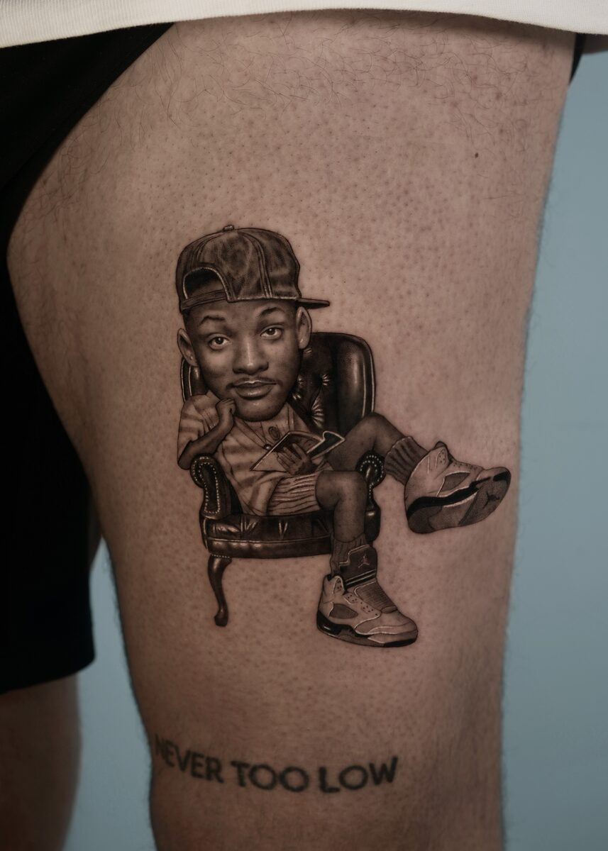 Caricatura microrealista de Will Smith en sillón, serie Big Heads
